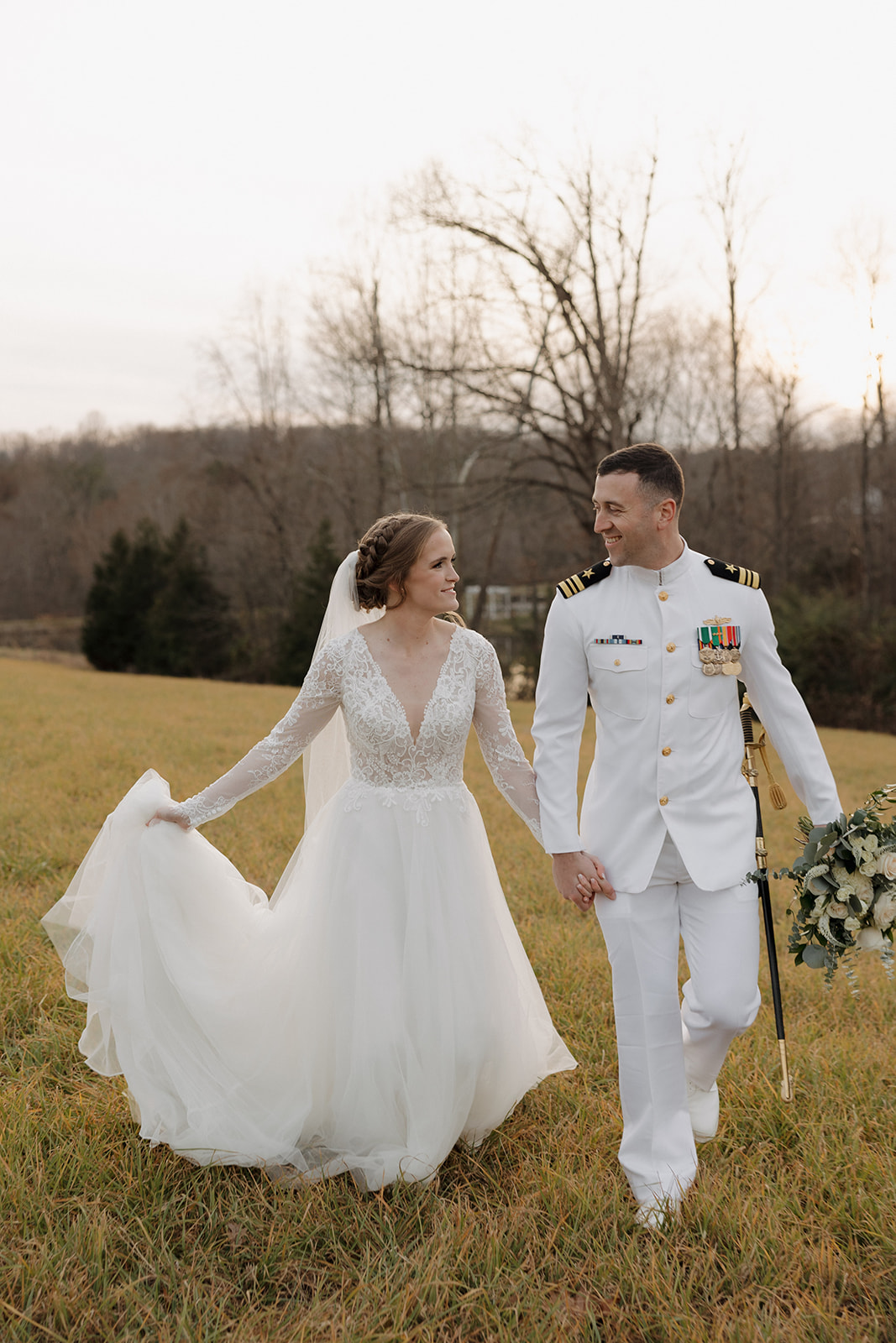 Destination elopement photographer captures bride and groom walking hand in hand