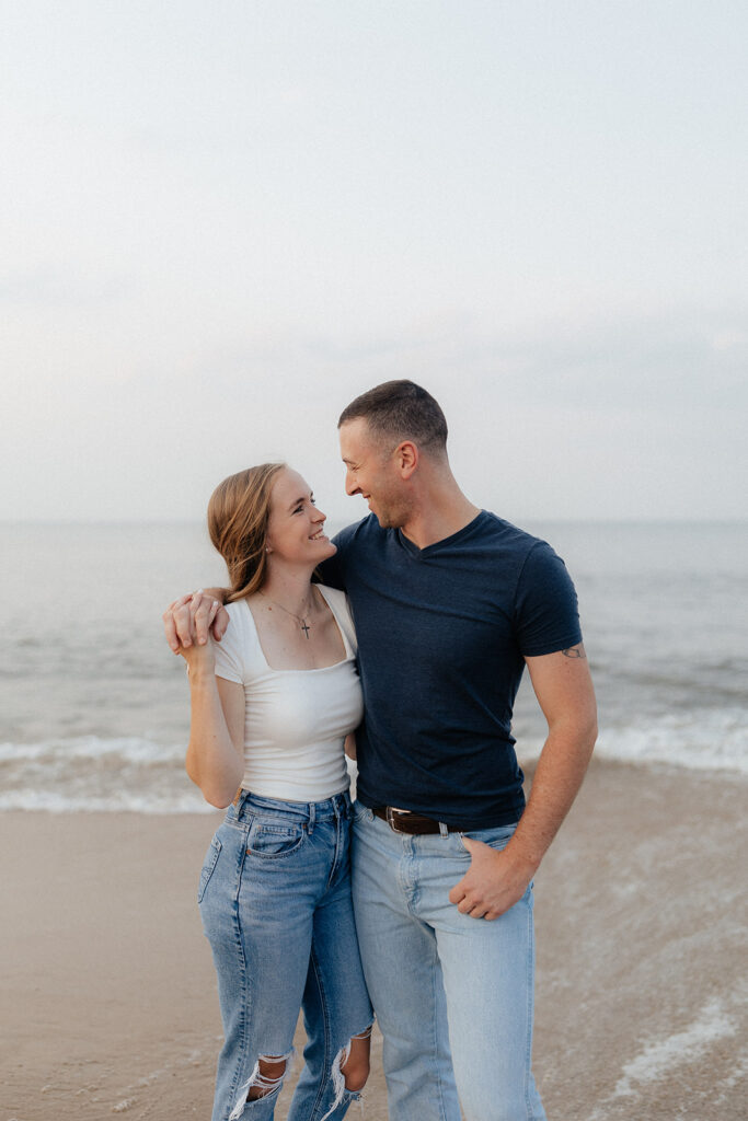 Destination elopement photographer captures couple at beach during engagement photos