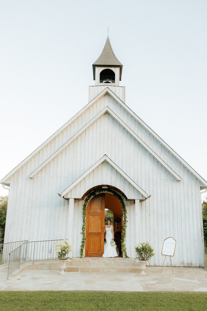 Tennessee wedding photographer captures bride standing in doorway of church