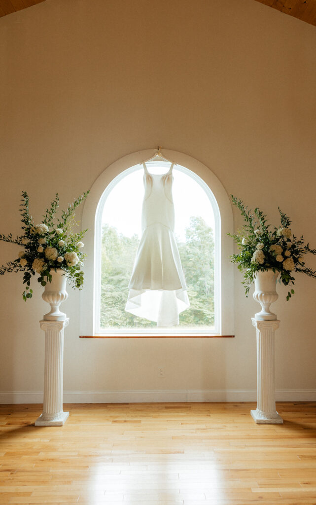 Tennessee wedding photographer captures wedding dress hanging 