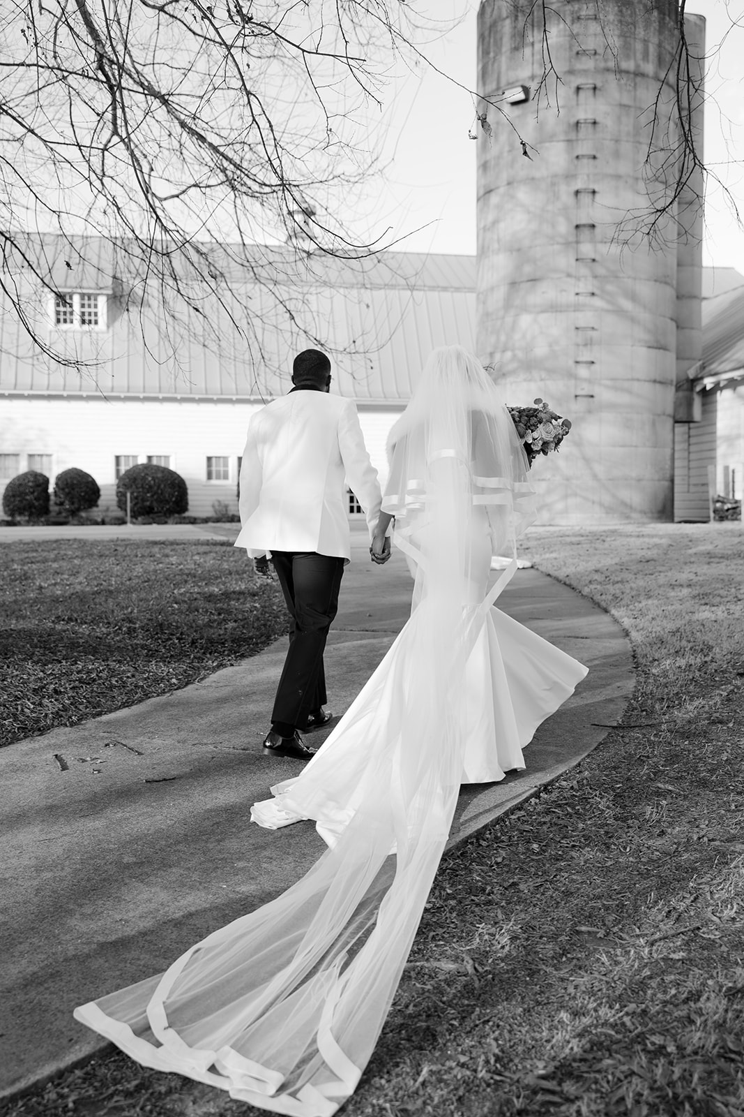 Tennessee elopement photographer captures bride and groom walking away together after elopement