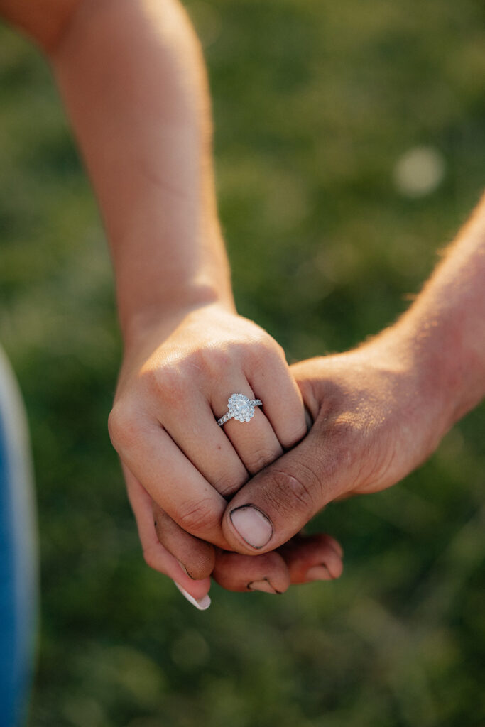 Tennessee elopement photographer captures couple holding hands and showing new engagement ring