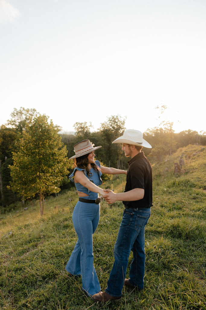 Tennessee elopement photographer captures man and woman dancing together during mountain engagement photos