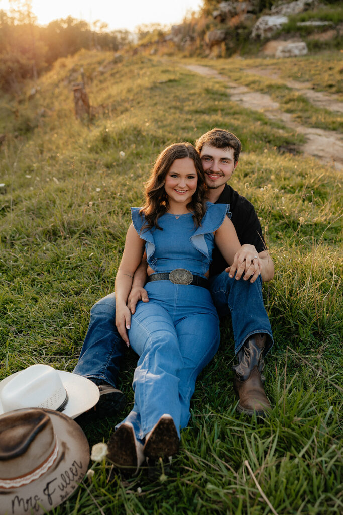 Tennessee elopement photographer captures couple sitting together in grass